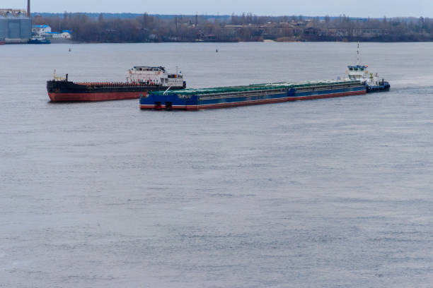 istock Cargo ship and barge sailing on the river Dnieper 904452982