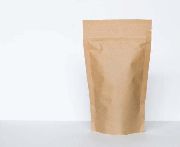 istock Brown paper bag on white background 904455836