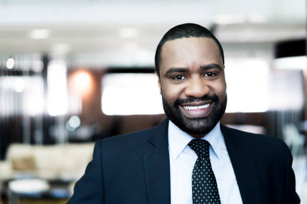 istock Close-up of smiling businessman at office 904456086