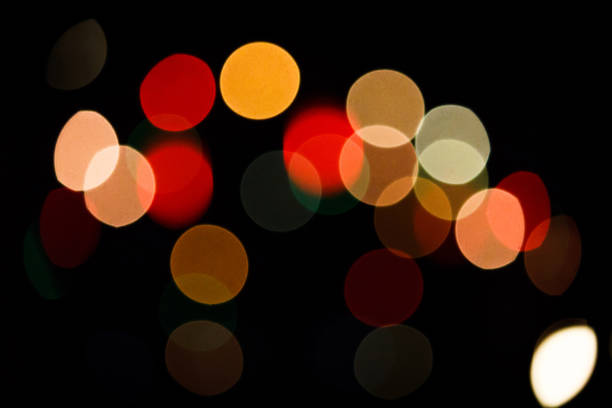 istock Colorful bokeh in dark. 904457390