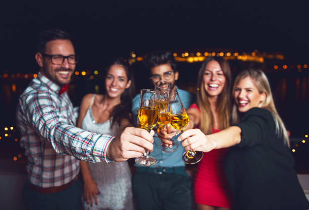 istock Group of people having a party on the roof 904460338