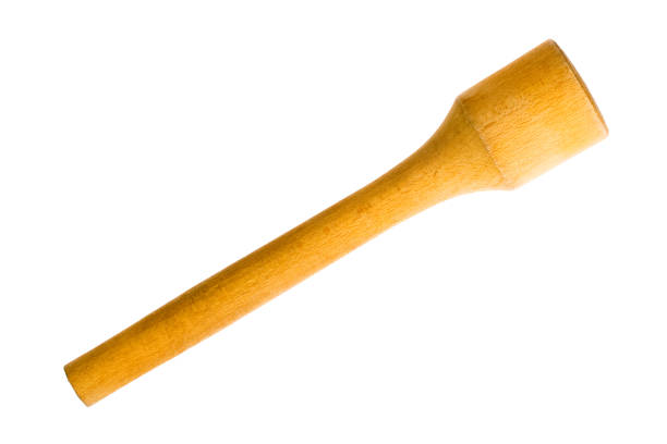 istock Old small wooden pestle isolated on white background 904465504