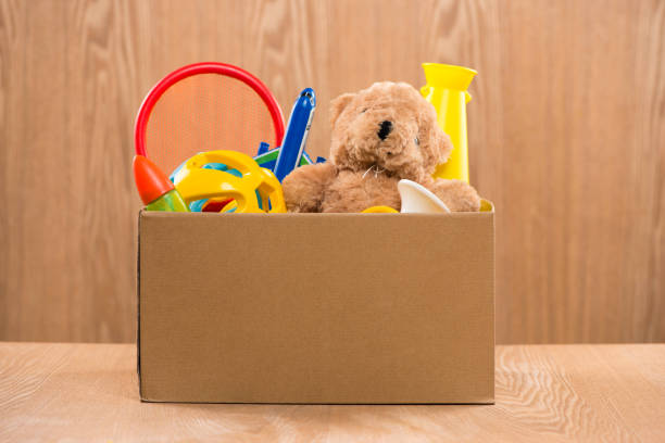 istock Toy. Donation box with  unwanted items for poor 904466100