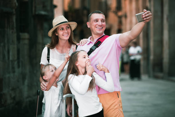 istock Travelers family taking selfie 904468768