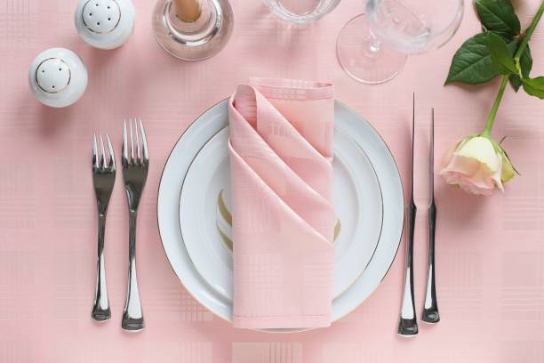 Festive table setting for Valentins Day, Easter, Mother's Day ore wedding. Elegant table decoration with fresh flowers.