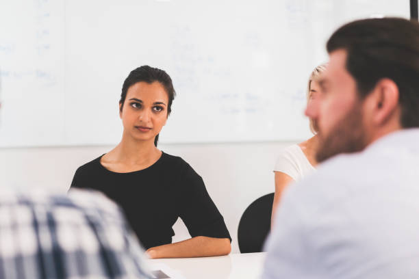 istock Serious business people sitting in meeting 904469462