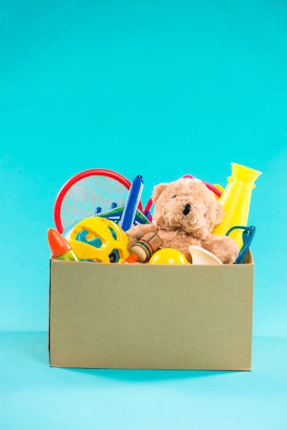 istock Toy. Donation box with  unwanted items for poor 904476992