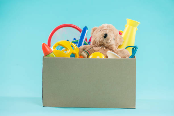 istock Toy. Donation box with  unwanted items for poor 904479114