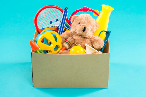 istock Toy. Donation box with  unwanted items for poor 904479180