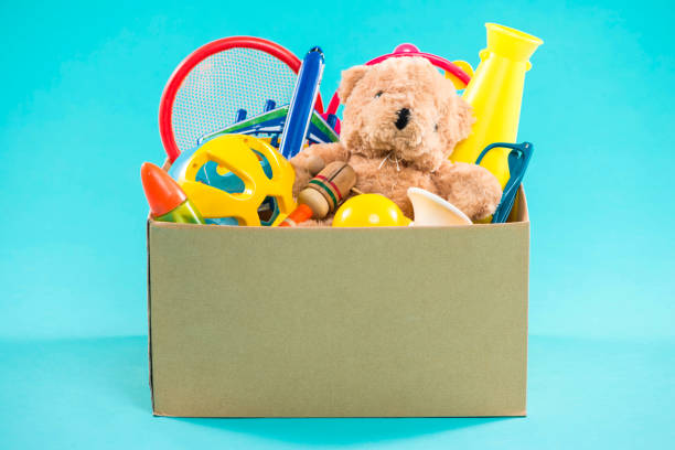 istock Toy. Donation box with  unwanted items for poor 904479570