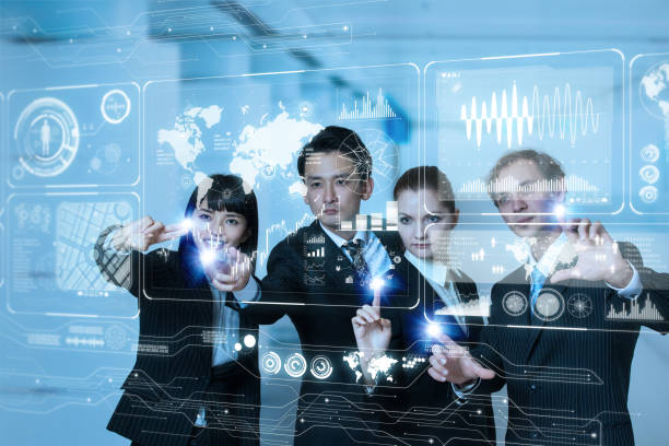 istock Group of people operating futuristic GUI. 904479914