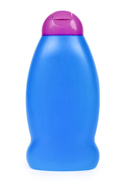 istock Red plastic bottle for shampoo isolated on white background. Hydiene and cleaning idea 904483704