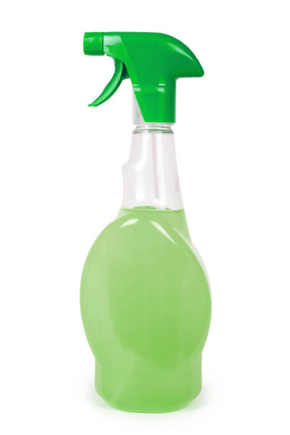 istock Cleaning spray bottle in hand isolated on white background. Housework and sanitary concept 904486268