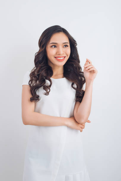 istock Friendly smiling young pretty asian woman portrait. 904487194