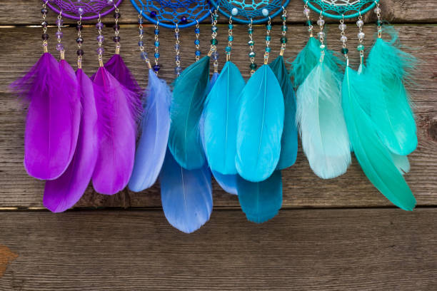 istock Handmade dream catcher with feathers threads and beads rope hanging 904487566