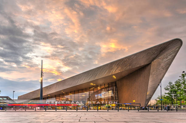 The characteristic shape of the new Rotterdam central railway station seen from the city center