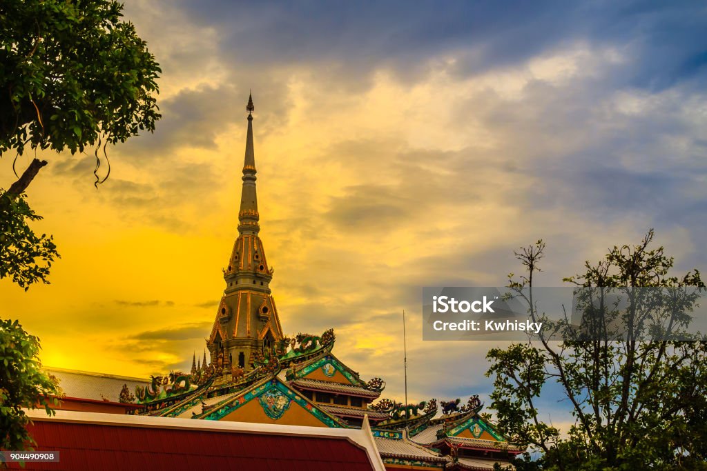 Beautiful golden pagoda at Wat Sothonwararam, a famous public temple in Chachoengsao Province, Thailand. Ancient Stock Photo