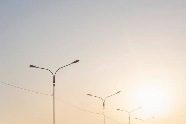 istock Urban clean sky with lamp pillars in sunset time 904495362