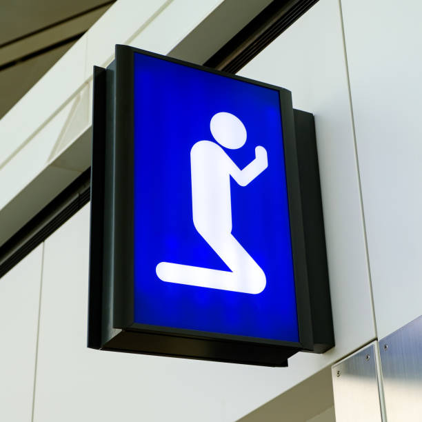 istock Prayer room sign lightbox in airport 904498936