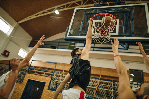 istock Slam dunk on basketball match! 904499450