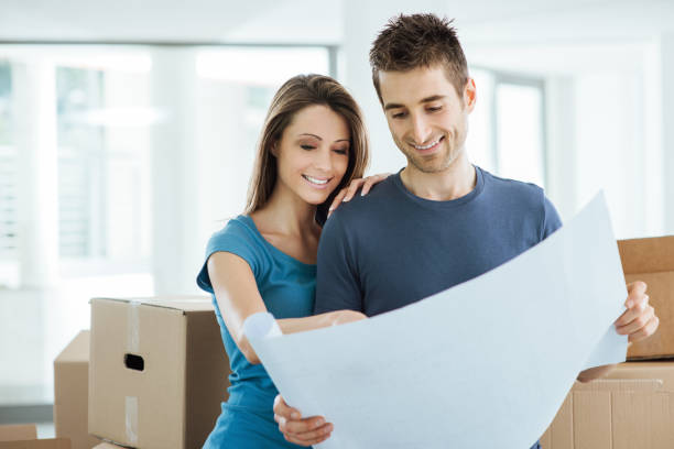 istock Young couple planning their new house 904506898
