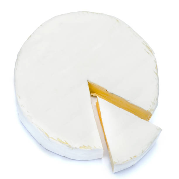 istock Round brie or camambert cheese on a white background 904516208