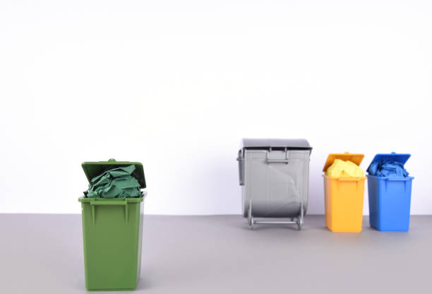 istock Colorful recycle bins on white and gray background. Recycling concept. 904518838