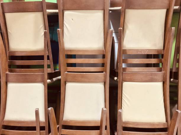 istock Row of chairs in warehouse 904518914