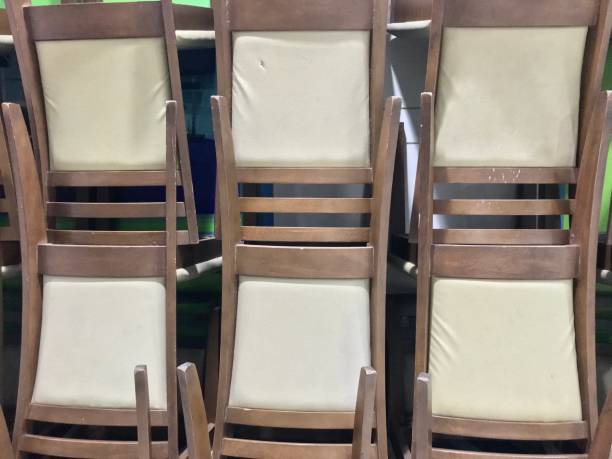 istock Row of chairs in warehouse 904518918