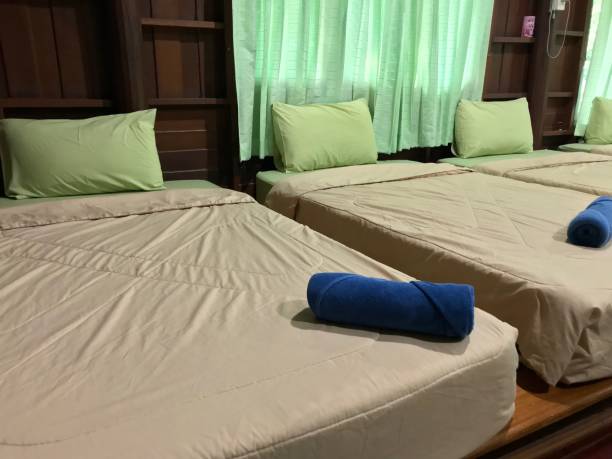 istock Row of mattress in bed room 904519700