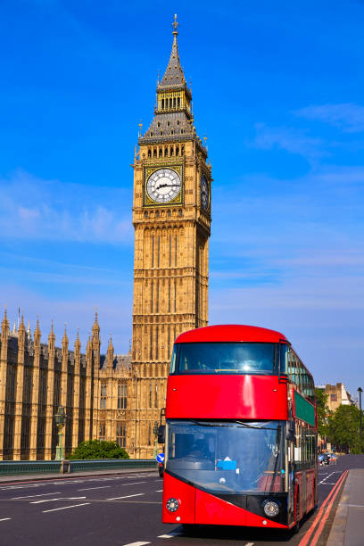 istock Big Ben Clock Tower and London Bus 904523434