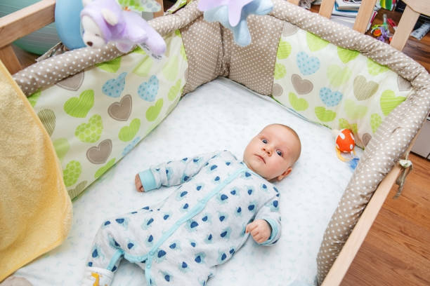 istock The baby in his crib. 904523444