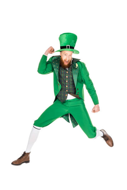 istock leprechaun jumping in green suit, isolated on white 904523562