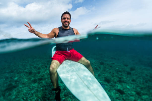 istock Happy surfer waits the wave on line up 904527200