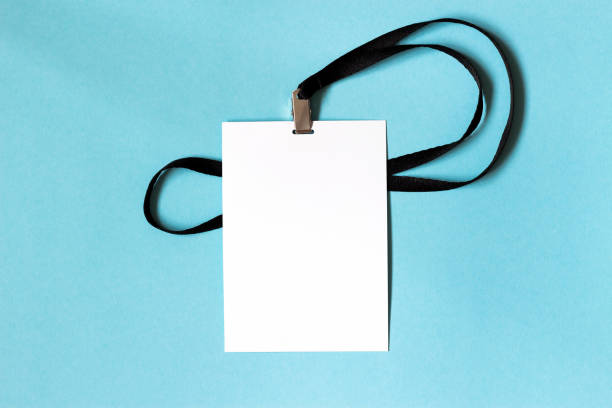 istock White blank paper badge mockup on blue background. Space for text. Template. 904527456