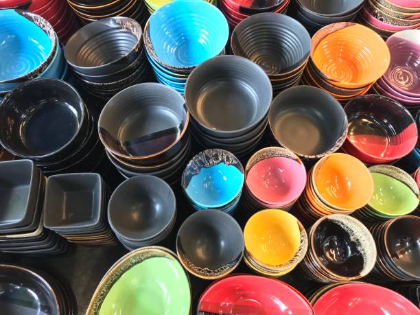 istock Stack of colorful ceramic bowl in the market 904527598