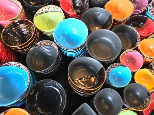 istock Stack of colorful bowl selling in the market 904528022