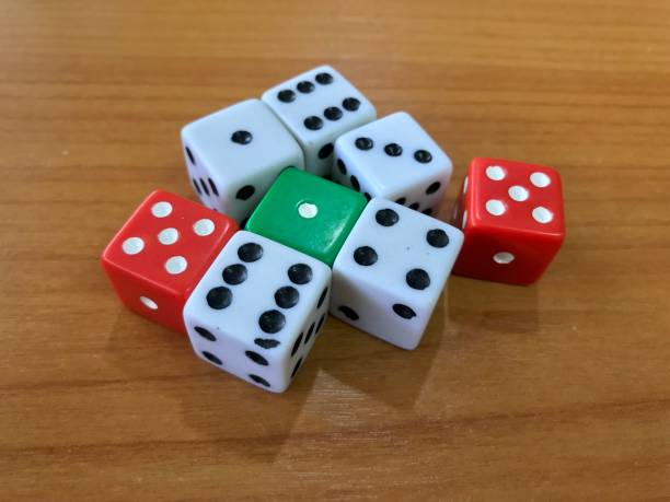 istock Group of dice on wooden table 904528330