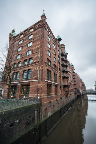 istock Alte Speicher, old storage, fleet in Speicherstadt, brick stone architecture. 904543562