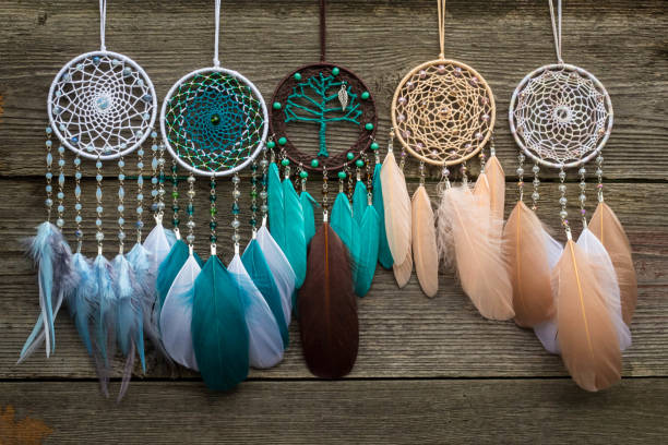 Handmade dream catcher with feathers threads and beads rope hanging