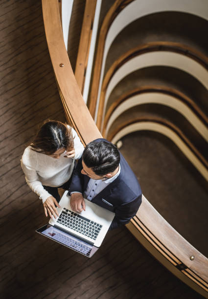 istock Business People Having a Meeting on The Hallway 904555492