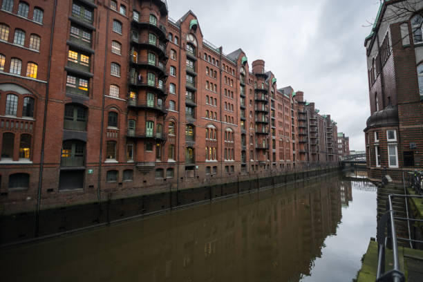 istock Alte Speicher, old storage, fleet in Speicherstadt, brick stone architecture. 904557766