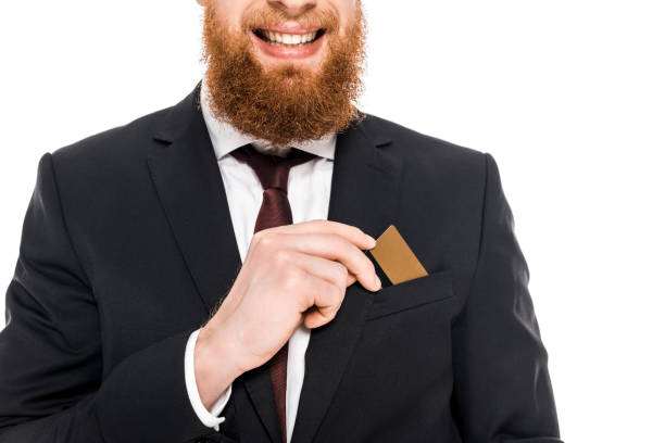istock businessman holding credit card isolated on white 904559242