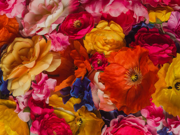 istock Flower Immersion still life background of textile flowers 904559334