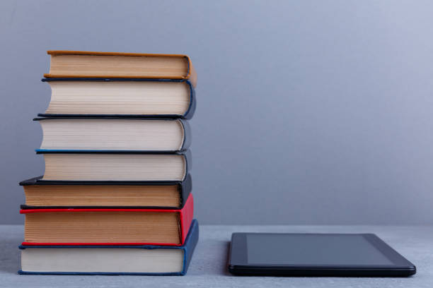 istock A stack of books and a tablet next. The concept of education. Foreground. 904559628