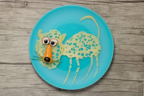 istock Leopard made with cheese and vegetables on plate and wood 904559984