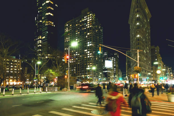 istock Manhattan motion blurred citylife at flatiron building 904570882