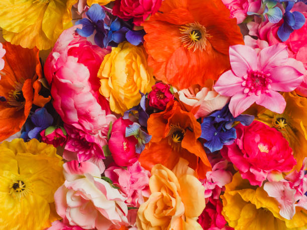istock Flower Immersion still life background of textile flowers 904571104