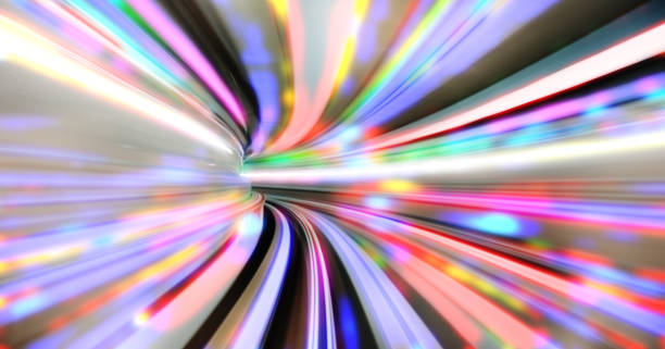 istock Abstract motion blurred train tunnel with travelling lights 904583558