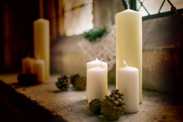 istock Candle in a church window cill 904586392
